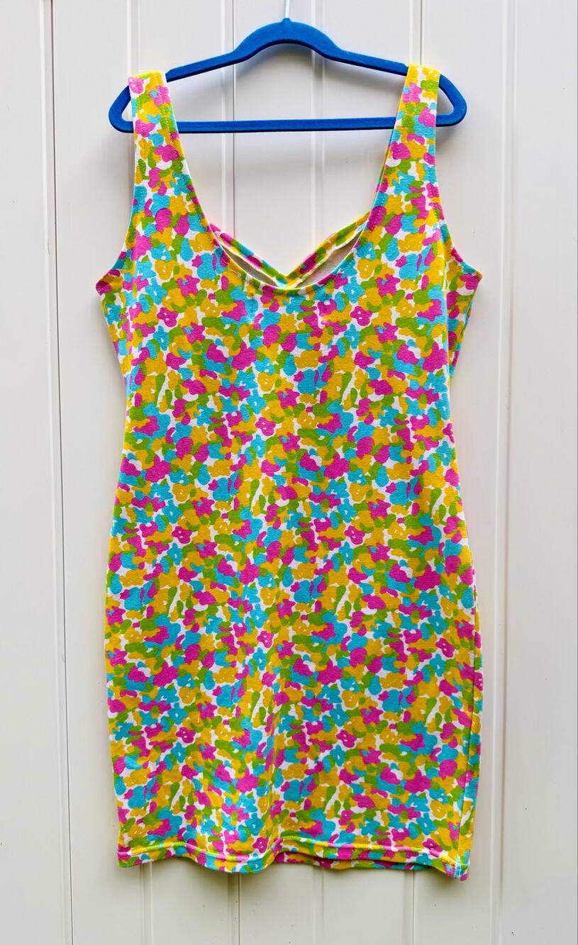 Authentic early 1990s vintage bodycon mini dress from Casino. Sz. L